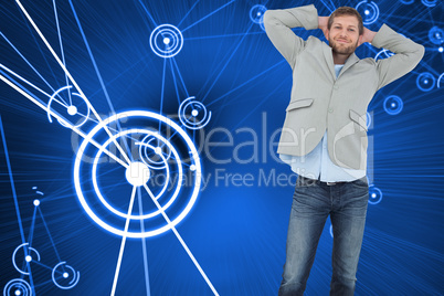 Composite image of suave man in a blazer with hands behind head