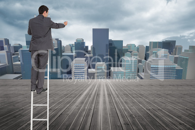 Composite image of businessman standing on ladder