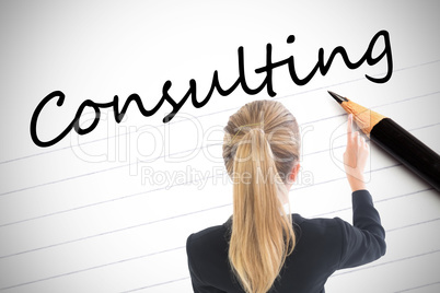 Composite image of businesswoman pointing somewhere