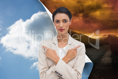 Composite image of charismatic businesswoman with her arms cross