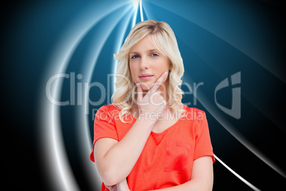 Composite image of teenager standing upright thoughtfully with h