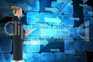 Composite image of businesswoman holding new tablet