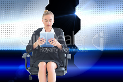 Composite image of front view of concentrated chic businesswoman