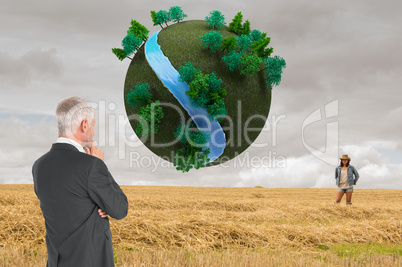 Composite image of thoughtful businessman standing back to camer