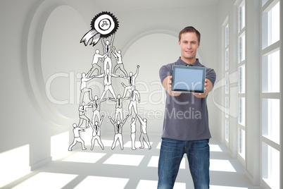 Composite image of young man showing screen of his tablet comput