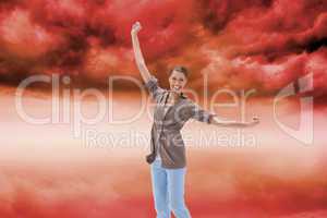 Composite image of happy woman jumping