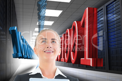 Composite image of businesswoman holding tablet