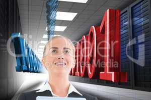 Composite image of businesswoman holding tablet