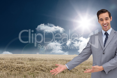 Composite image of happy businessman giving a presentation with