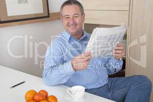 man reading the newspaper in his spare time