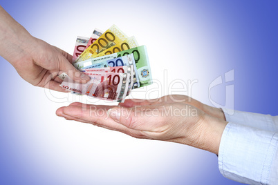 hand gives money in open hands