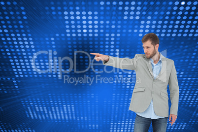 Composite image of trendy model pointing to something