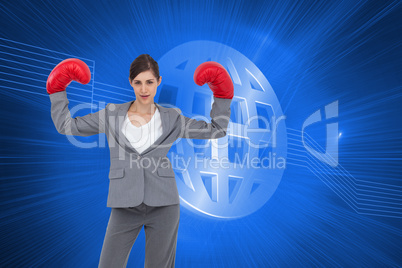 Composite image of businesswoman with boxing gloves