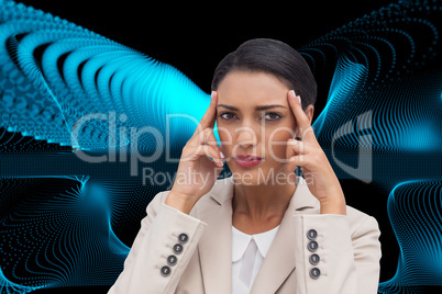 Composite image of young businesswoman putting her fingers on he