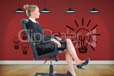 Composite image of businesswoman sitting on swivel chair in blac