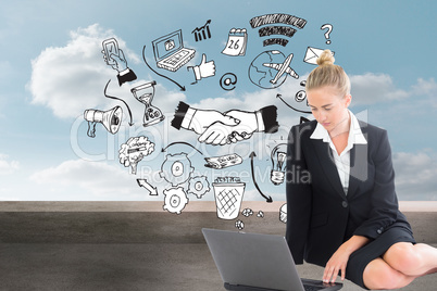 Composite image of businesswoman using laptop