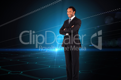 Composite image of businessman with folded arms