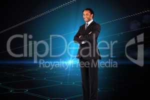 Composite image of businessman with folded arms