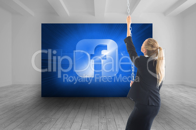 Composite image of businesswoman pulling a chain