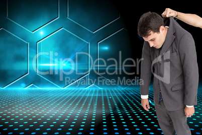 Composite image of businessman hanging