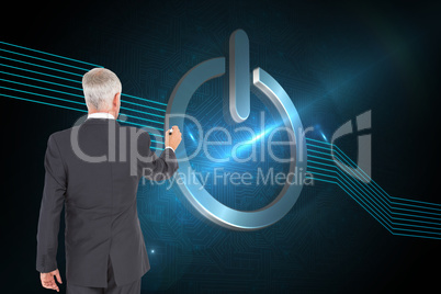 Composite image of rear view of businessman standing and writing