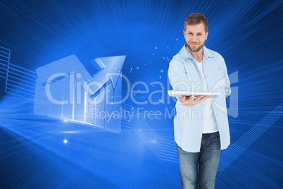 Composite image of happy man showing laptop to camera and smilin