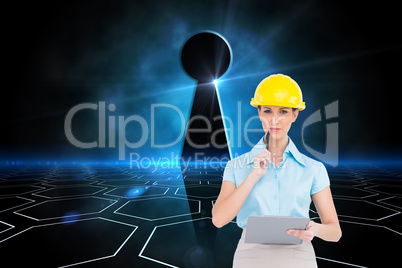 Composite image of thoughtful attractive architect holding clipb