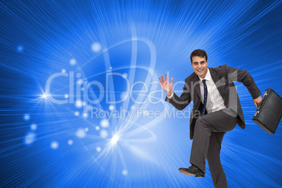 Composite image of happy businessman in a hury