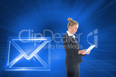 Composite image of businesswoman holding new tablet