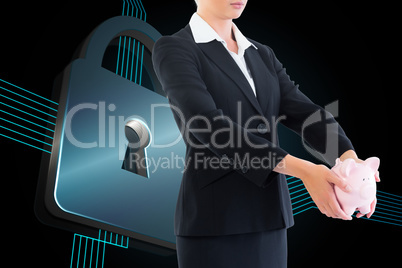 Composite image of businesswoman holding piggy bank