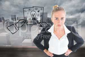 Composite image of businesswoman standing with hands on hips