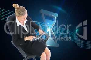 Composite image of businesswoman sitting on swivel chair with ta