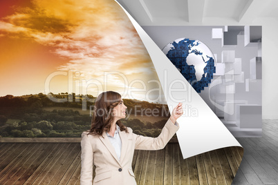 Composite image of brunette businesswoman pulling