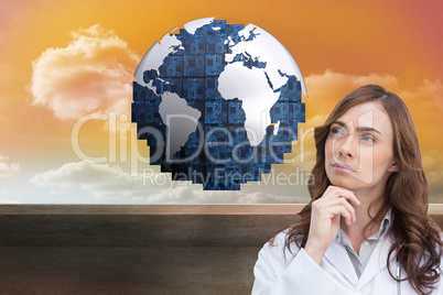 Composite image of thoughtful doctor looking away