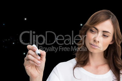 Composite image of concentrated businesswoman holding whiteboard