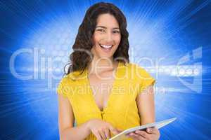 Composite image of smiling casual young woman scrolling on her t