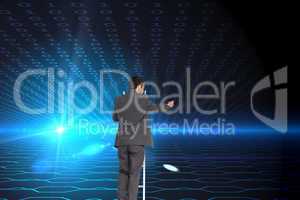 Composite image of businessman standing on ladder