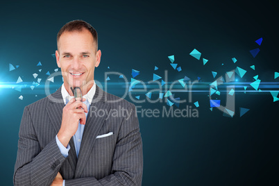 Composite image of smiling businessman holding glasses