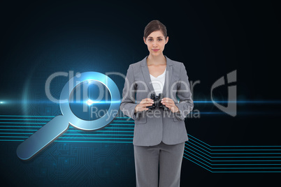 Composite image of young businesswoman with binoculars