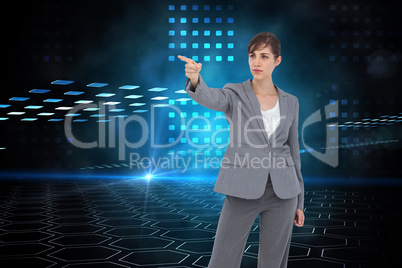 Composite image of young businesswoman pointing to something