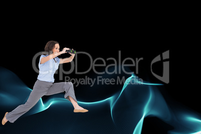 Composite image of cheerful classy businesswoman jumping while h