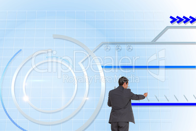 Composite image of businessman standing on ladder