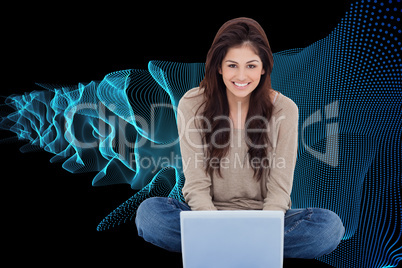 Composite image of woman sitting on the bed with the laptop in f