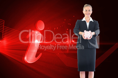 Composite image of happy businesswoman holding a piggy bank