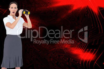 Composite image of astonished elegant businesswoman holding bino