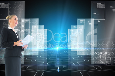 Composite image of businesswoman holding new tablet Composite image of businesswoman holding new tablet