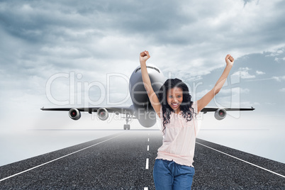 Composite image of a young happy woman stands with her hands in