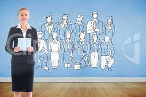 Composite image of businesswoman holding new tablet