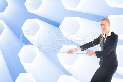 Composite image of businesswoman pulling a rope