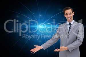 Composite image of happy businessman giving a presentation with